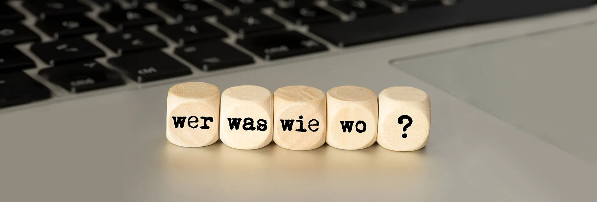 Leistungsinformation zur Pension: Würfel mit Fragen Wer, Was, Wie, Wo?