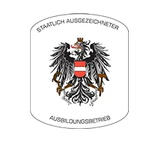 Wappen der Republik Österreich mit dem Hinweis "Staatlich ausgezeichneter Ausbildungsbetrieb"